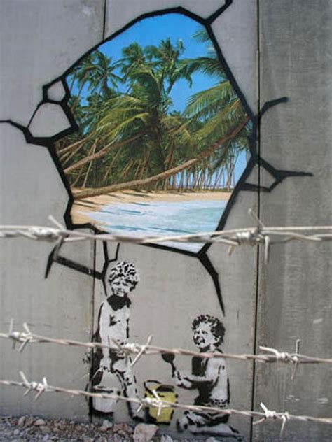 banksy artwork beach in wall